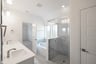 bathroom with walk-in shower and tub 