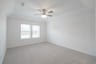 bedroom with carpet and ceiling fan 