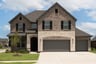 two-story home with brick and stone exterior