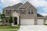 two-story home with brick and stone exterior