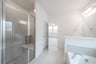primary bathroom with soaking tub and walk-in shower