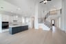 great room with wood flooring and pet space 