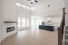 great room with high ceilings and large windows 