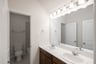 bathroom with two sinks and white countertops 