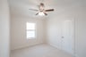 game room with window and carpet 