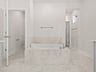 primary bath with dual sinks, soaking tub and walk in shower