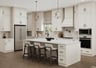 kitchen with white cabinets and quartz counters