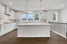 kitchen with white cabinets and quartz counters