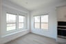 breakfast area with large windows and wood flooring 