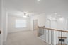 game room with carpet and ceiling fan 