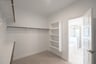 closet with hanging racks and shelves 