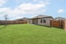 backyard with grass and covered patio