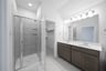primary bathroom with soaking tub and walk-in shower