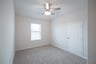 gameroom with carpet and ceiling fan