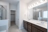 primary bathroom with soaking tub and walk-in shower