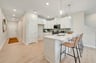 kitchen with view of the foyer