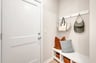 mudroom with a bench and hooks