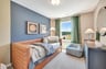 secondary bedroom with carpet