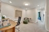 loft with a desk and two chairs