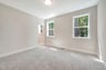 secondary bedroom with carpet