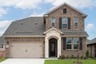 two-story home with brick and stone exterior