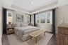 primary bedroom with tray ceiling