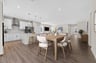 dining table off the kitchen with designer flooring