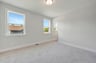 secondary bedroom with carpet