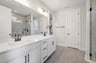 primary bath with two sinks