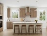 kitchen with wood-finish cabinets & white quartz counters