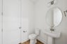 powder room with a pedestal sink