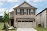 two-story home with brick and shutters
