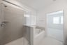 primary bathroom with soaking tub and walk-in shower
