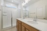 primary bathroom with an oversized shower