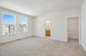 primary bedroom with two windows