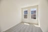 secondary bedroom with carpet