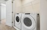 laundry area with a washer and dryer