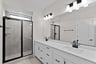 primary bathroom with an oversized shower