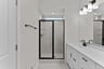primary bathroom with a walk-in shower