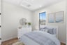 secondary bedroom with a window