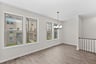 dining room with four windows