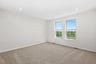 primary bedroom with natural light