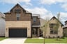 two-story home with brick and stone exterior