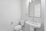 powder bathroom with pedestal sink