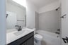 guest bathroom with soaking tub