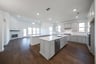 kitchen with large islands and white countertops 