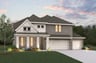 two-story home with brick and stone exterior and 3-car garage