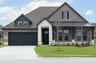 one-story with brick and stone exterior