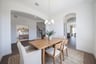 open dining room with hardwood flooring