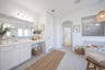 spacious primary bathroom with soaking tub